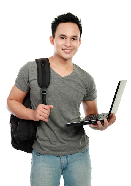 Studente di college con il computer portatile isolato