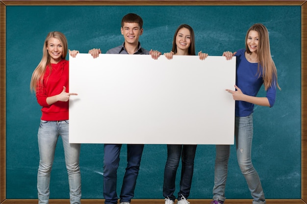 College Students Holding a Blank Sign