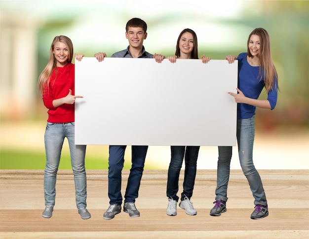 College Students Holding a Blank Sign