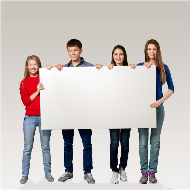 College Students Holding a Blank Sign