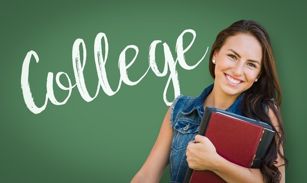 Photo college written on chalk board behind mixed race young girl student holding books