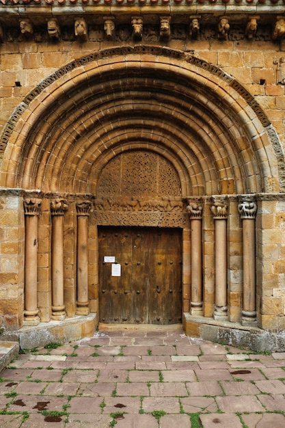 The Collegiate Church of San Pedro de Cervatos is a Romanesque Catholic church located in Cervatos Cantabria Spain