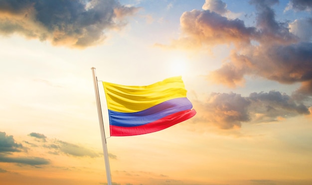 Colombia national flag waving in beautiful sky