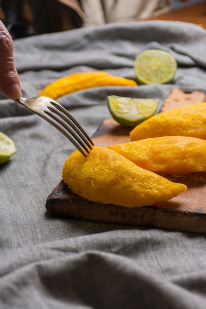 Colombian empanadas, made of meat and fried in oil.