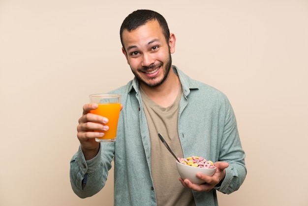 Colombian man holding a bowl of cereals