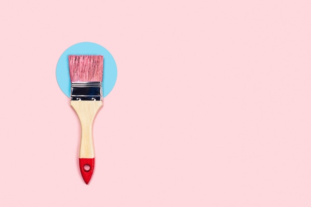 Color background with pink paint brush