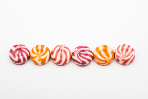 Фото Цветные конфеты на белом