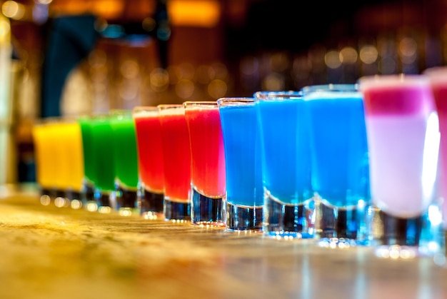 Photo color cocktails on a bar stand