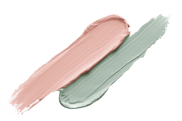 Color correcting concealer strokes isolated on white