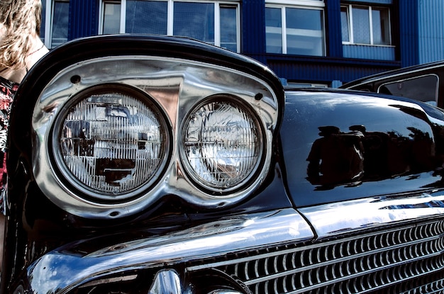 Color detail on the headlight of a vintage car