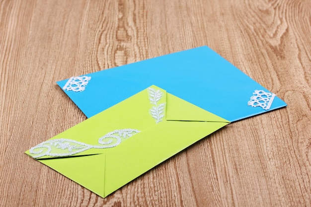 Photo color envelopes on wooden background