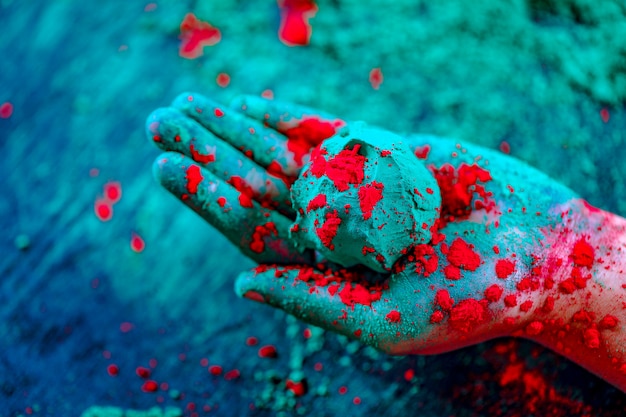 Color in hand , Indian Festival Holi