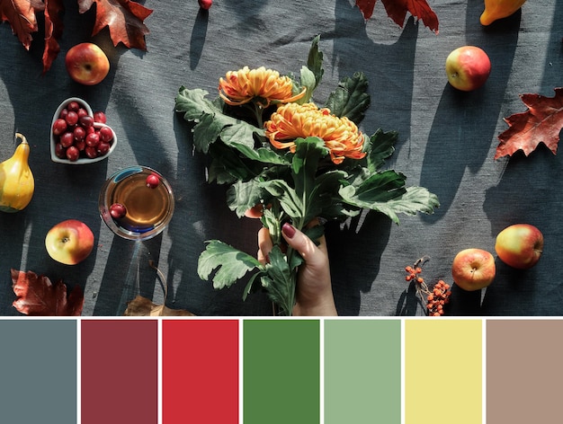 Color matching palette from image of orange chrysanthemum flowers dry bunny tail grass and red oak