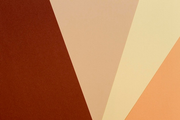 Color papers geometry composition background with beige yellow and brown tones