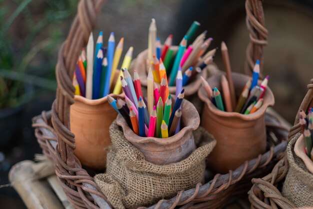 Color pencil in the basket, back to school concept