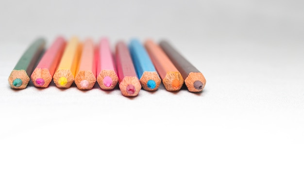 Color Pencil Stacked on the paper with beautiful bokeh