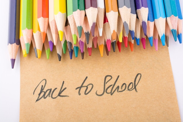 Color pencils and back to school title