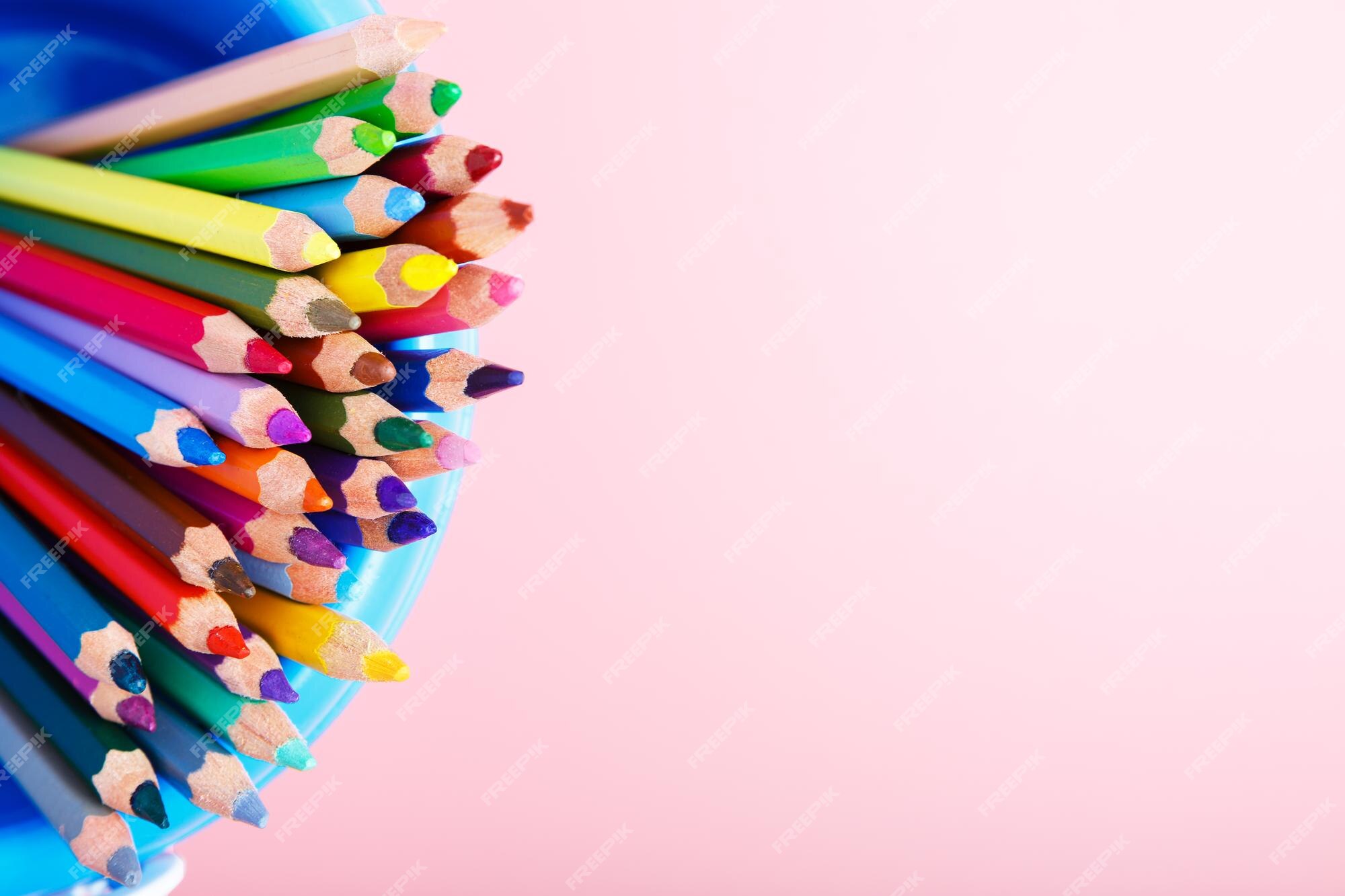 Premium Photo  Pink background from color pencils, art supplies