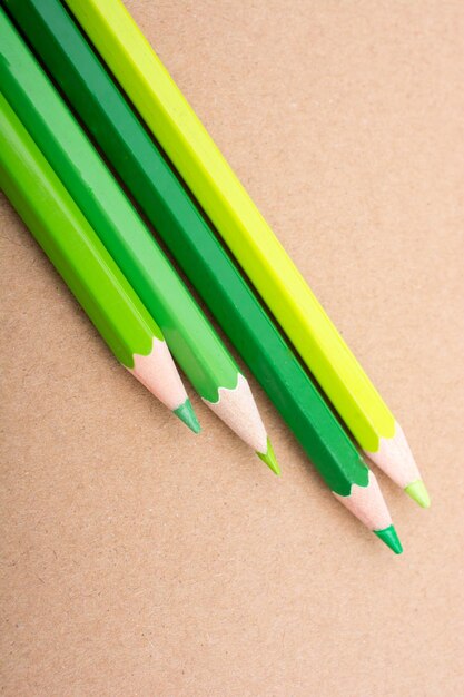 Photo color pencils on a brown background