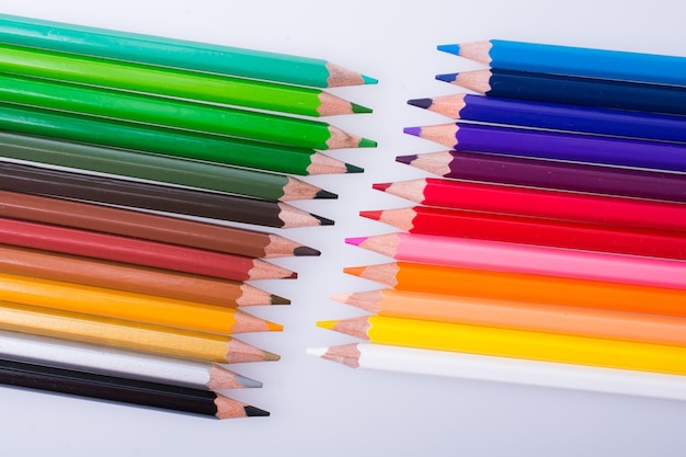 Color Pencils placed on a white background