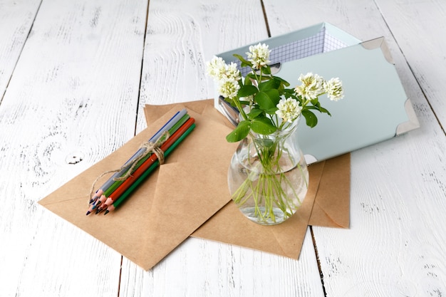 color pencils with white clover