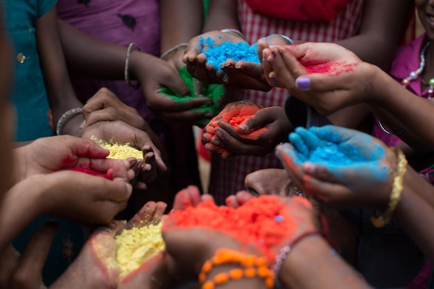 Photo color powder on hands during holi festival