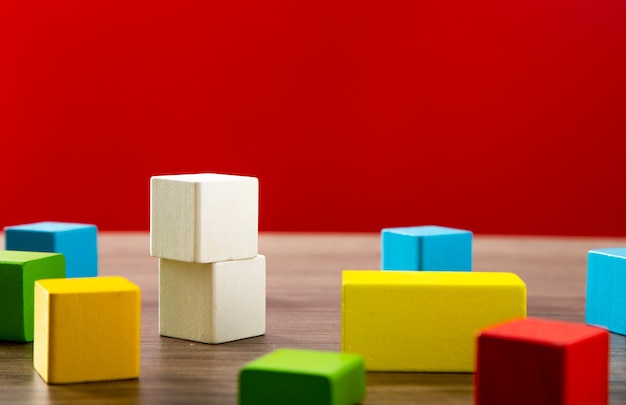 Color wooden block on wooden table