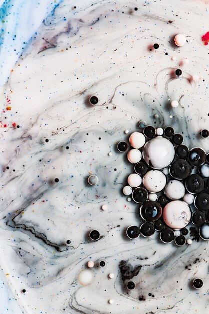 Цветной абстрактный фон. Чернильные пузыри в воде. Абстрактная красочная краска. Макро фото