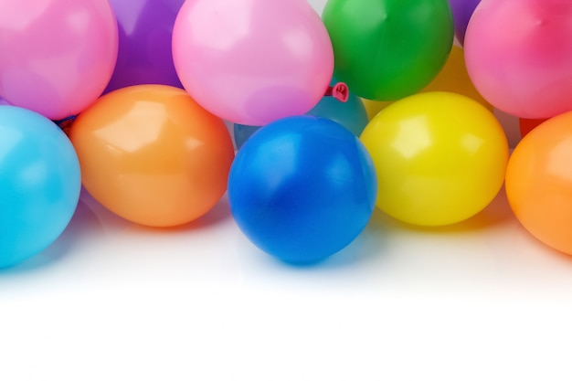 Colored balloons on white background