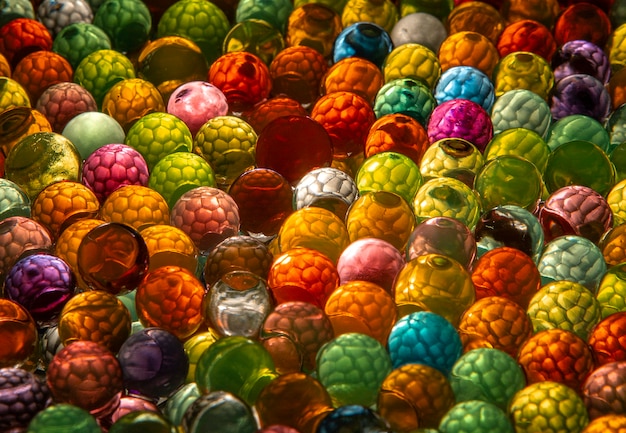 Colored balls with cell shapes inside and illuminated that give a unique and mesmerizing effect