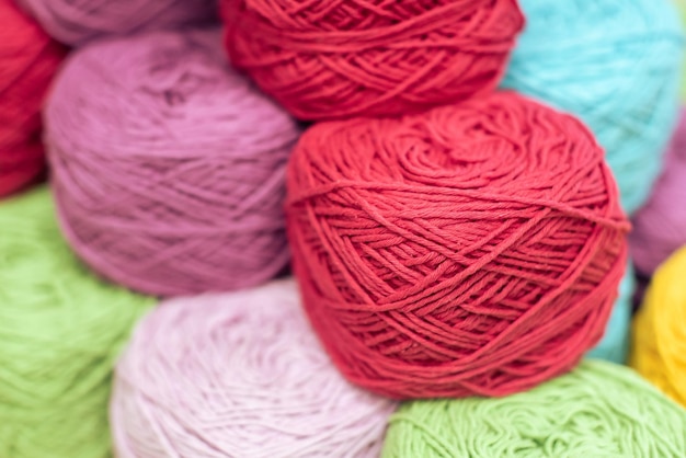 Colored balls of yarn. View from above. Rainbow colors. All colors. Yarn  for knitting. Skeins of yarn. Stock Photo