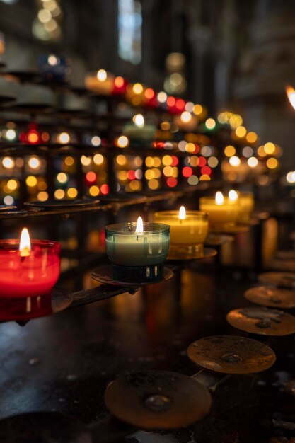 Photo colored candles in a church