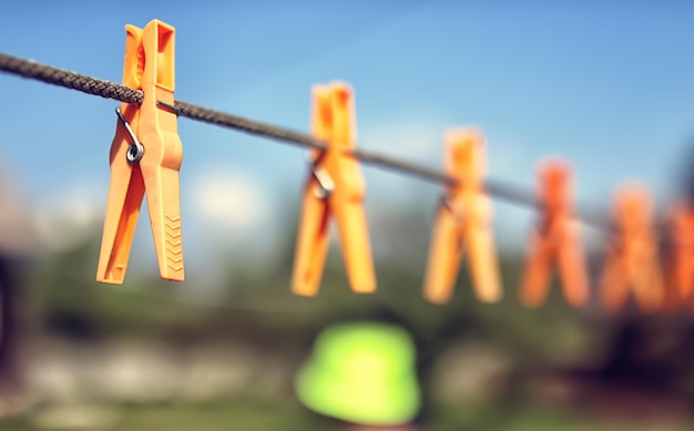 Colored clothespin on the rope outdoor