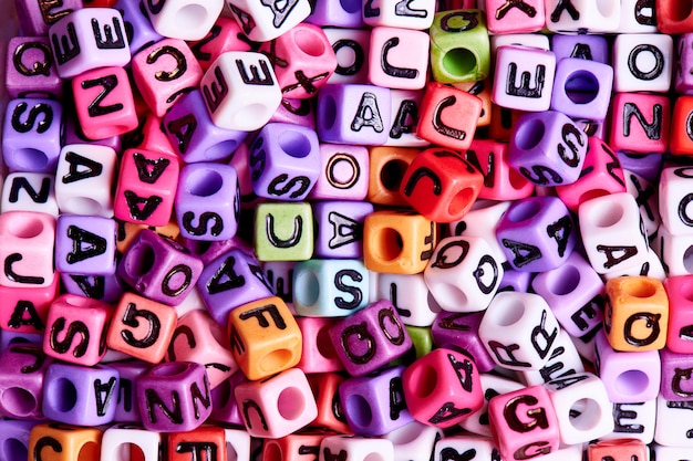 Colored cubes with English letters close-up.Texture and Background concept.