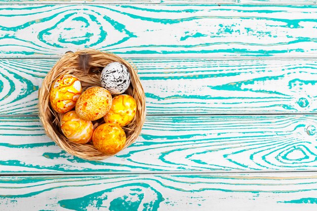 Colored easter eggs in a basket