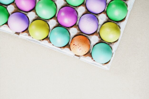 Colored Easter eggs, minimal design, copy space