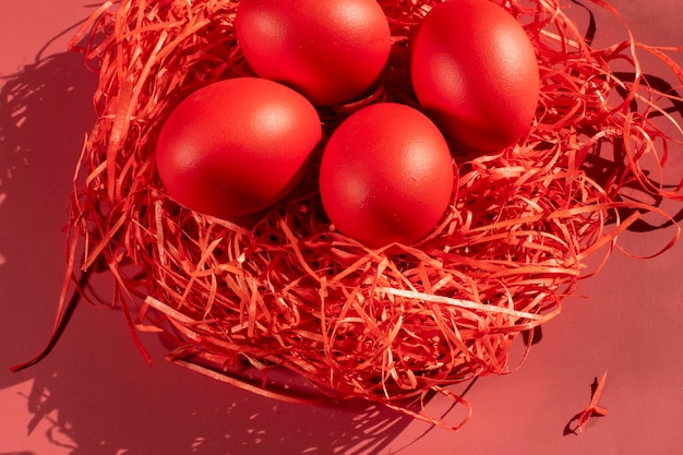 Colored eggs symbolize Easter in shades of red