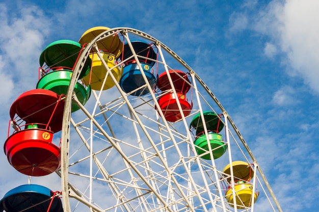 A colored ferris wheel in a children park