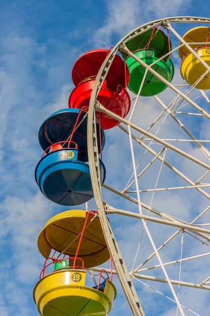 A colored ferris wheel in a children park