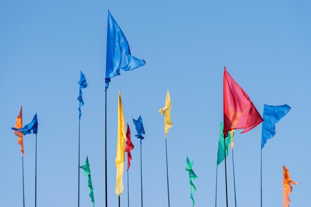 Colored flags against the sky