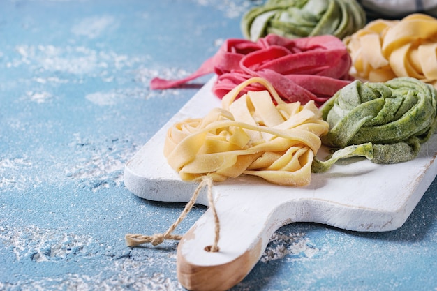 Colored fresh homemade pasta tagliatelle