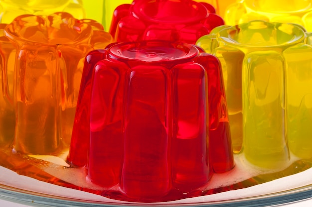 Colored fruit jelly on white background