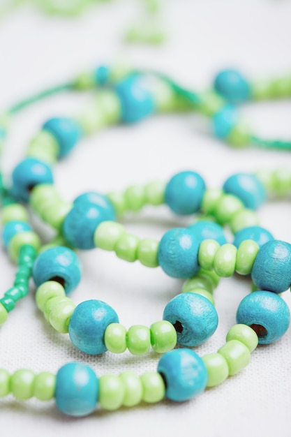 Colored glass beads and thread beads