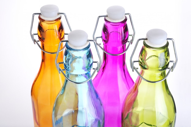 Photo colored glass bottles with airtight stopper