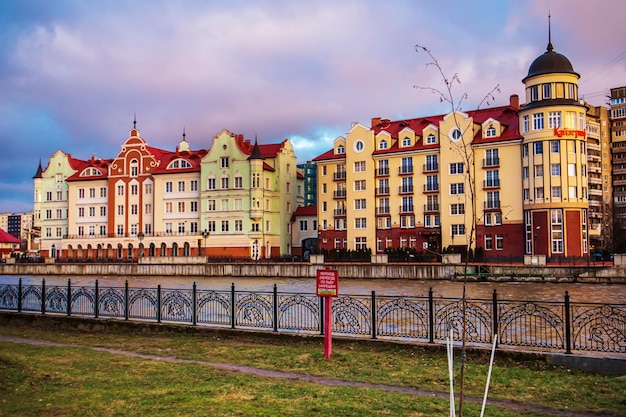 Colored houses on the central embankment at sunset in Kaliningrad