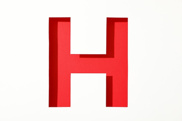 Photo colored letter h on white background