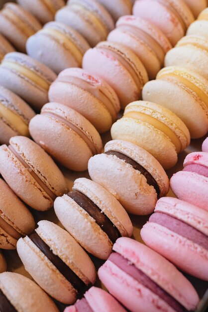 Photo colored macaroons. sweet dessert cake for the whole family. set with different flavors