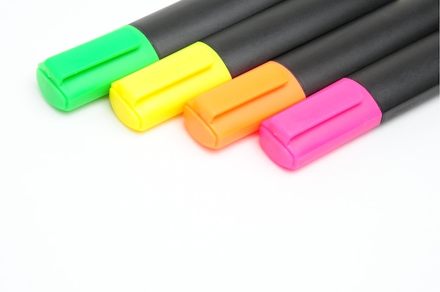 Colored markers for drawing on an isolated white background