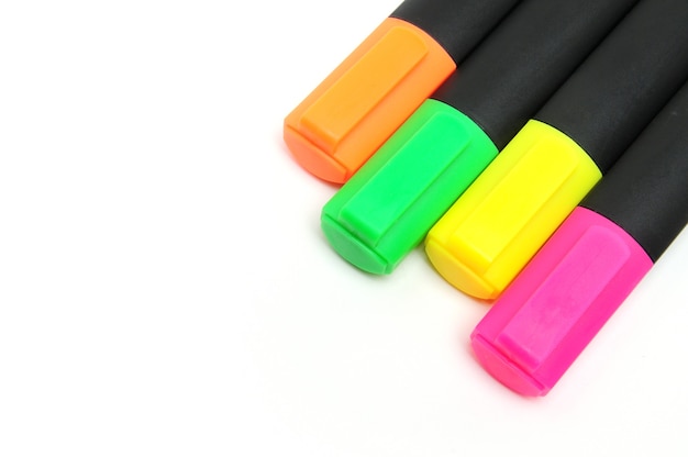 Colored markers for drawing on an isolated white background