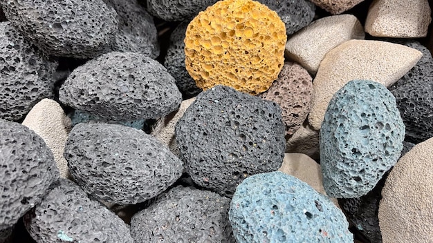 Colored natural pumice stone stall in the street bazaar of Aswan Egypt